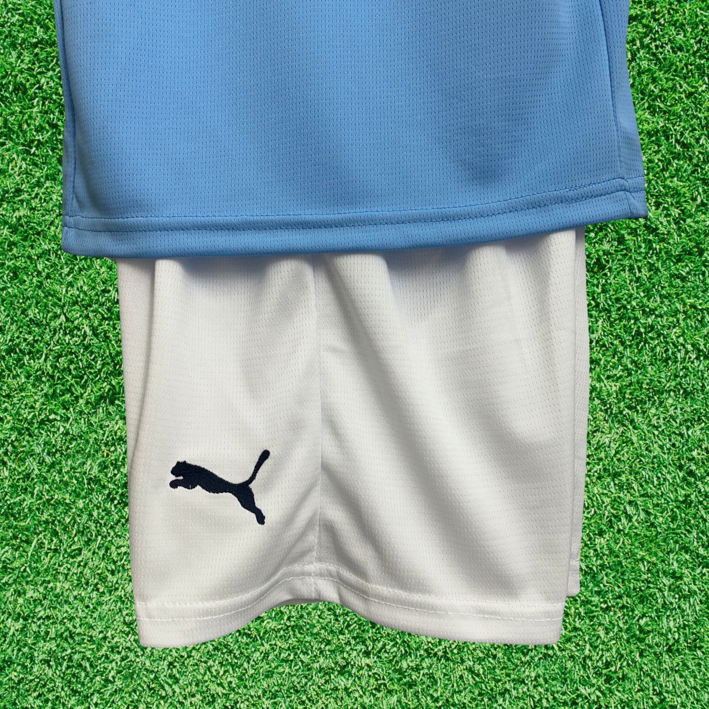 Kit infantil del Manchester City I 25/26 